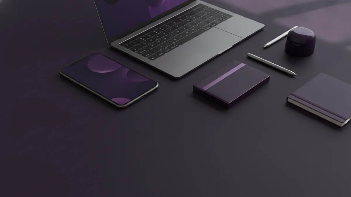 Build a digital business card Minimal digital business card setup with phone, laptop, and neat desk accessories